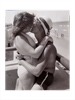 couple kissing on beach