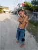 boy in road in Belize